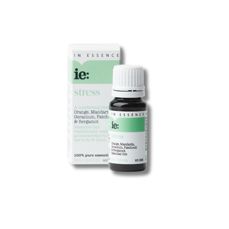 In Essence 'ie: stress' essential oil bottle with its white and mint green packaging box, shown on a clean white background.