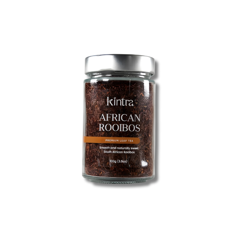 A glass jar of Kintra African Rooibos tea with a silver lid and a black label, set against a plain white background.