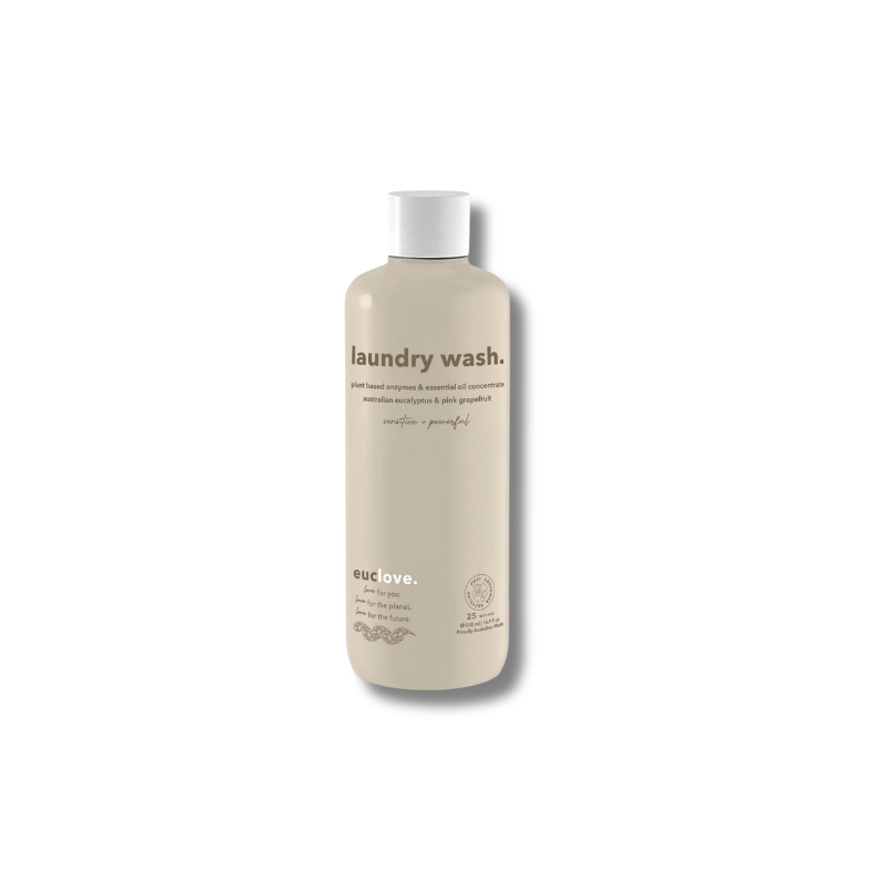 Beige bottle of laundry wash with white cap on a white background