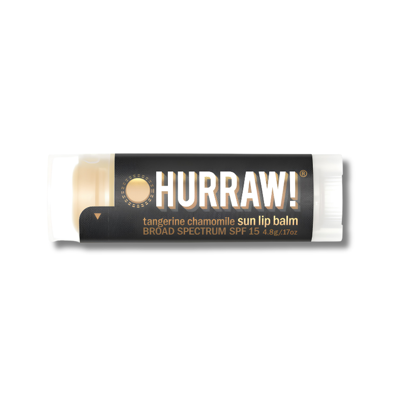 A tube of Hurraw! Tangerine Chamomile Sun Lip Balm with a black label and white caps, shown on a plain white background.