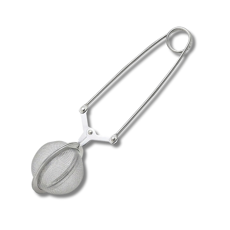 Metal tea ball strainer on a white background