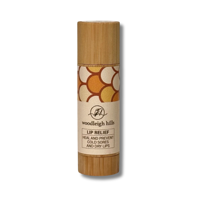 Lip balm with wooden casing on a white background