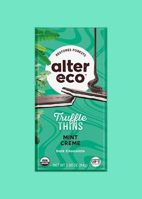 Packaging of Alter Eco Organic Mint Creme Dark Truffle Thins, with a green background and an image of the chocolate truffles with mint creme filling. The packaging states 60% cacao, gluten-free, and fair-trade.