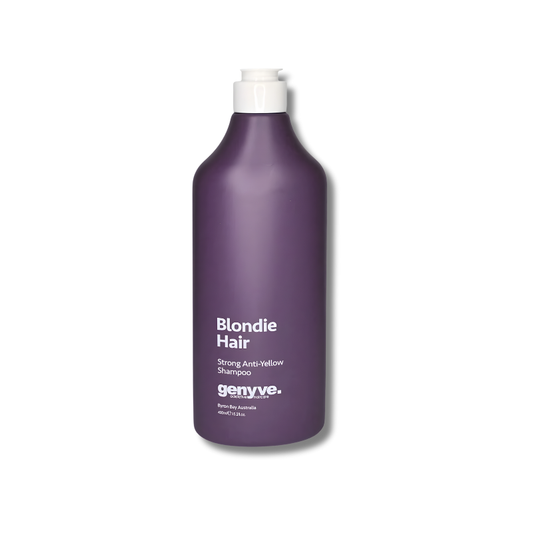 Purple shampoo bottle with white cap on a white background