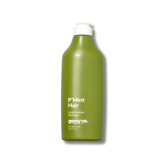 Green shampoo bottle with white cap on a white background
