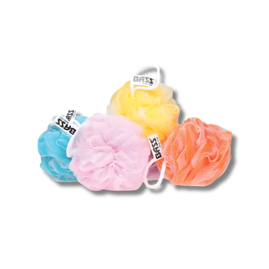 Four colorful loofahs with 'BASS' branding on a white background