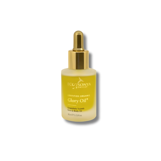Yellow bottle of Eco by Sonya Glory Oil with gold cap on a white background