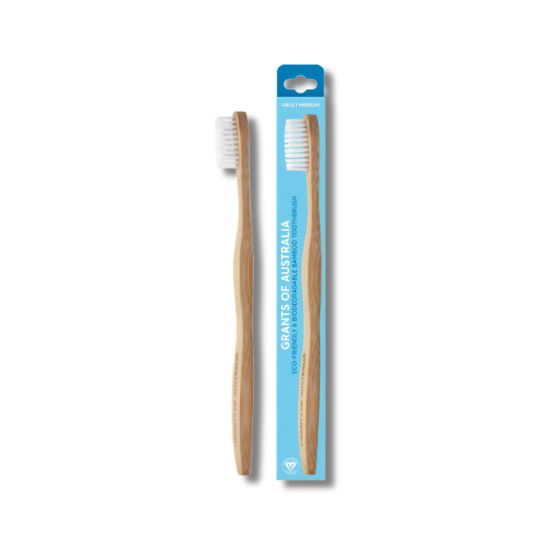 bamboo toothbrush with their packaging on a white background