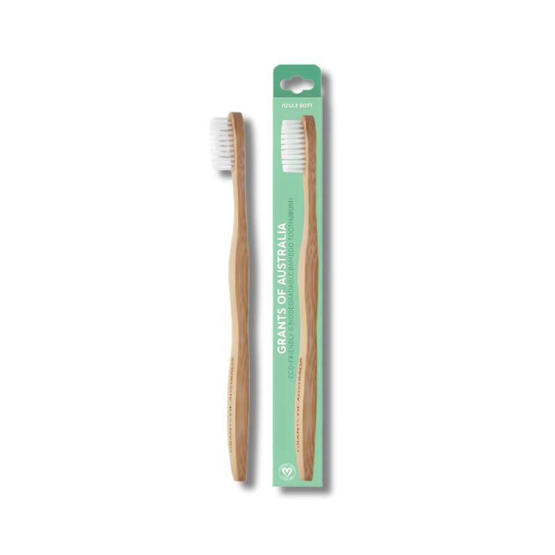 bamboo toothbrush with one in packaging on a white background