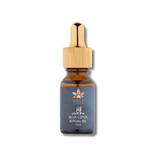 Bottle of Holy Sanity Blue Lotus Ritual Oil with a dropper on a white background