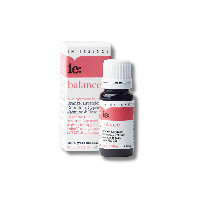 In Essence 'ie: balance' essential oil bottle and its retail box, featuring a white and pink color scheme on a clean white background.