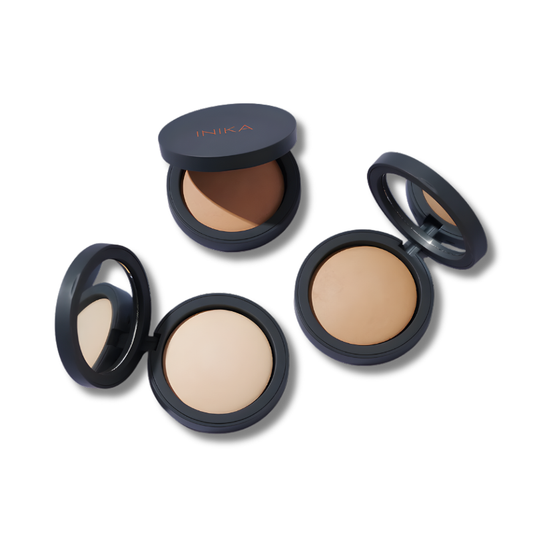 INIKA Organic Baked Mineral Foundation pressed powder compacts in multiple shades with buildable coverage for a natural finish