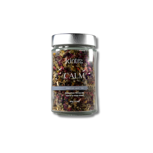 A clear glass jar of Kintra Calm Cranberry Leaf Tea with a metallic silver lid, set against a plain white background.