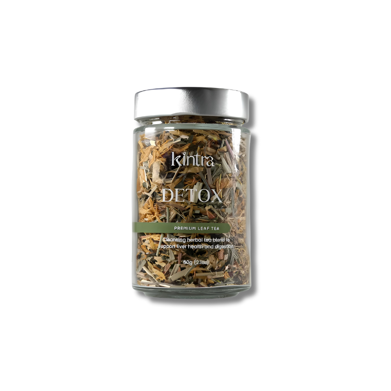 A clear glass jar of kintra Detox Premium Leaf Tea with a silver lid and a green label, set against a plain white background.