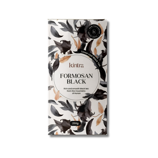 Kintra Formosan Black loose leaf black tea in a 250g rectangular box with a white background, black watercolor-style birds and leaves, and a central white oval label.