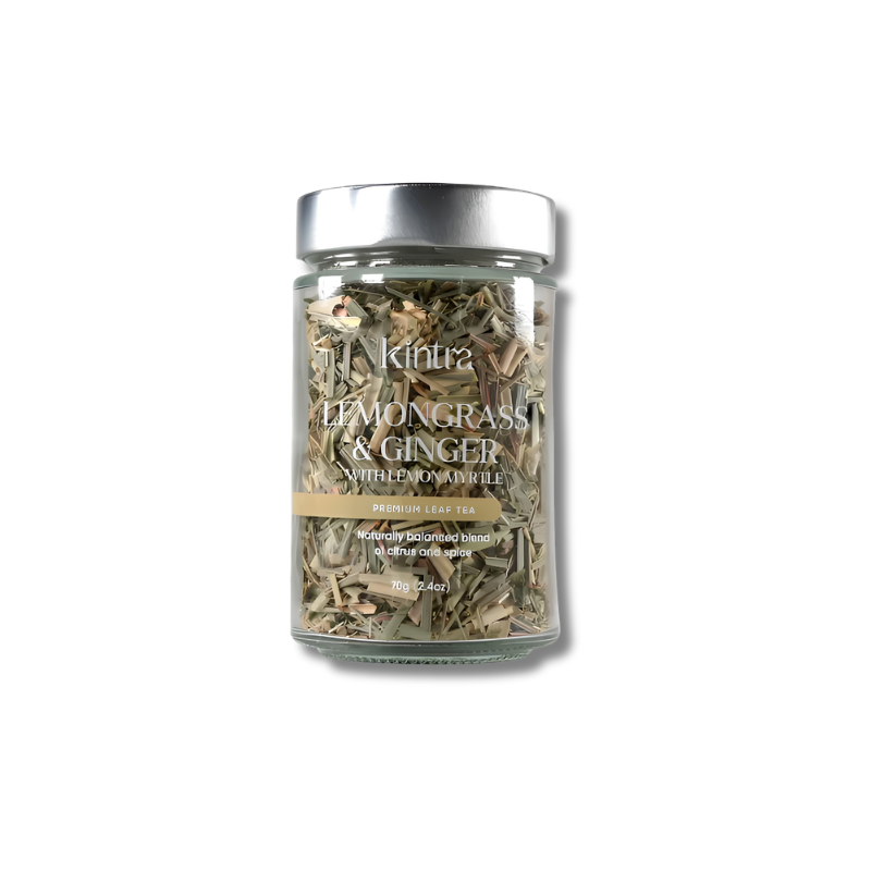 A glass jar of Kintz Lemongrass and Ginger herbal tea blend with a silver lid, shown on a plain white background.