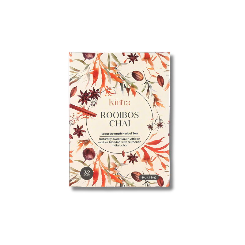 A pack of Kintra Rooibos Chai herbal tea, featuring a cream-colored box decorated with illustrations of orange cinnamon sticks, brown star anise, and green leaves, set against a plain white background.