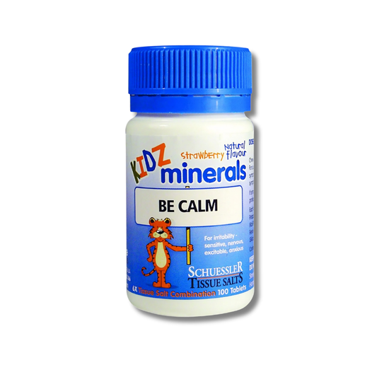 Bottle of Schuessler Tissue Salts Kidz Minerals with a blue cap on a white background