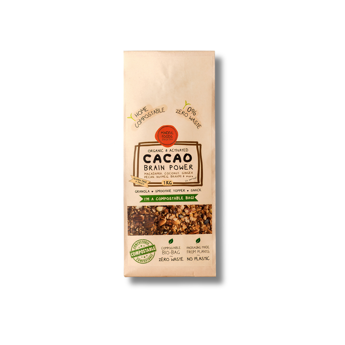 A package of Organic & Accurate Cacao Brain Power granola, featuring a beige paper bag with a clear window showing the mixed nuts and cacao pieces inside.