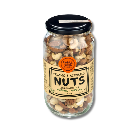A glass jar of 'Organic & Activated Nuts' by Mindful Foods, filled with mixed nuts and topped with a black lid, shown on a white background.