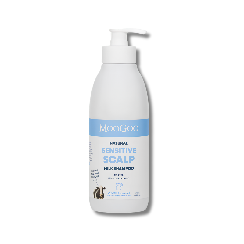 MooGoo sensitive scalp milk shampoo bottle on a white 