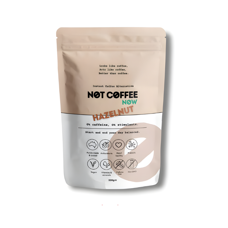 Beige and white packaging of 'Not Coffee Now' hazelnut instant coffee alternative on a white background