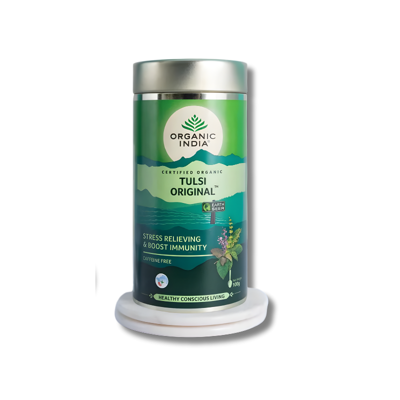 100g loose leaf Triple Tulsi tea blend featuring Rama, Krishna, and Vana Tulsi in a premium wellness tin.