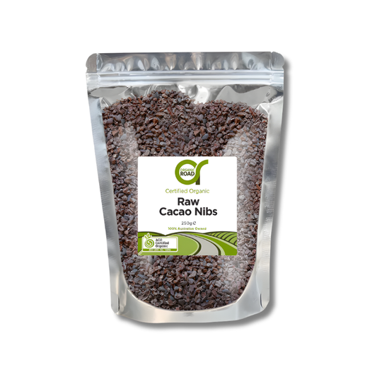 Packaging of raw cacao nibs with a visible brand label on a white background