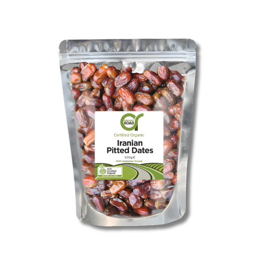 Packaged Iranian pitted dates with a visible brand label on a white background