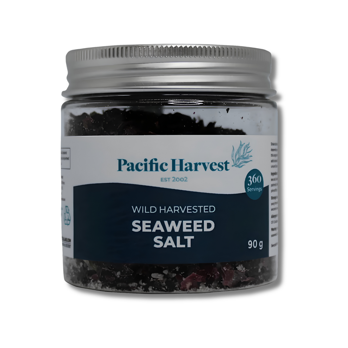 Pacific Harvest Wild Harvested Seaweed Salt in a 90g clear plastic jar with a silver metal lid and a white and navy label.