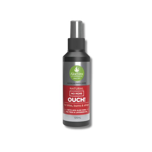 Bottle of 'Ouch!' natural pain relief spray with Aloe Vera label on a white background