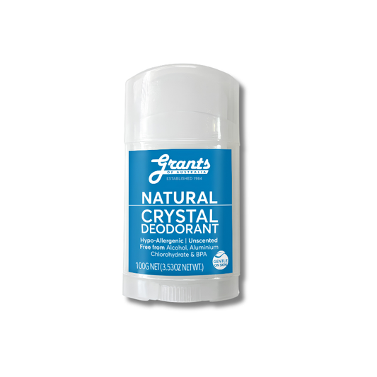 A single stick deodorant container on a plain white background. The product is labeled 'Grants Natural Crystal Deodorant' with a bright blue label and white text and cap.
