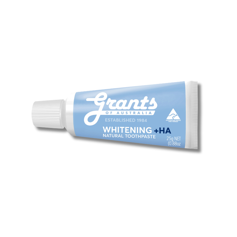 A tube of Grants of Australia Whitening + HA Natural Toothpaste, featuring a light blue and white design with a ribbed white cap, shown on a plain white background.