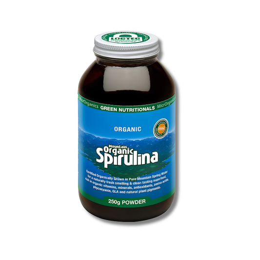 A bottle of green nutritionals Organic Spirulina powder, 250g, featuring a dark amber bottle, a silver cap, and a blue and green label.