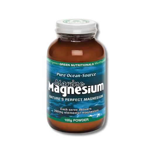 A bottle of Marine Magnesium powder by Green Nutritionals. The product is in an amber brown bottle with a white cap, featuring a blue and green label with white text.