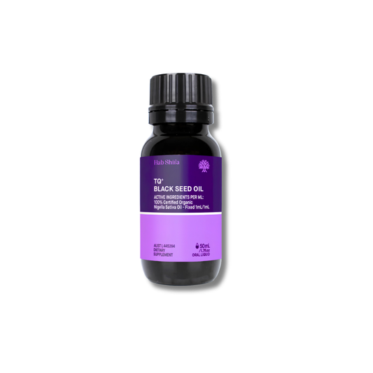 A 10ml bottle of Hab Shifa T2+ Black Seed Oil with a black cap and a purple label, set against a plain white background.