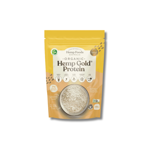 A stand-up pouch of Hemp Gold Protein powder by Organic Hemp Foods Australia, featuring a yellow and orange design with a clear window showing the off-white powder inside.