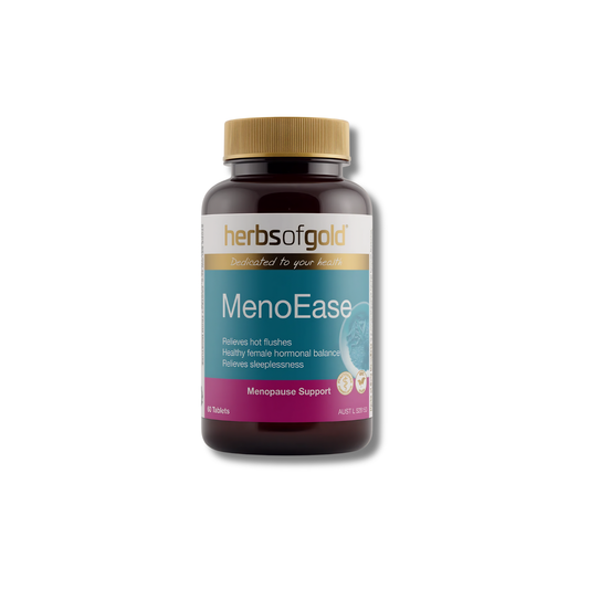 A bottle of herbs of gold MenoEase dietary supplement, featuring a dark amber brown bottle, a gold cap, and a label with teal, white, and magenta sections, set against a plain white background.