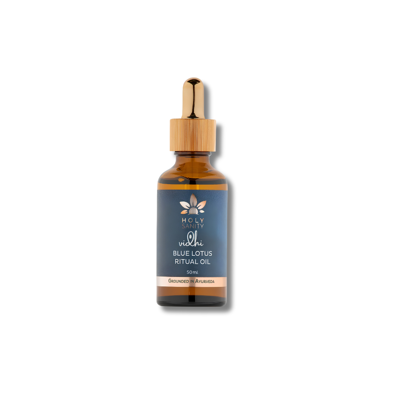 Bottle of Blue Lotus Ritual Oil with a dropper on a white background