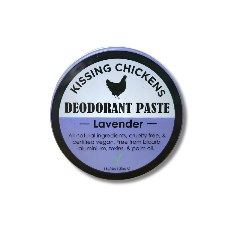 A round tin of Kissing Chickens Deodorant Paste in Lavender, featuring a black, white, and lavender label with a chicken silhouette.