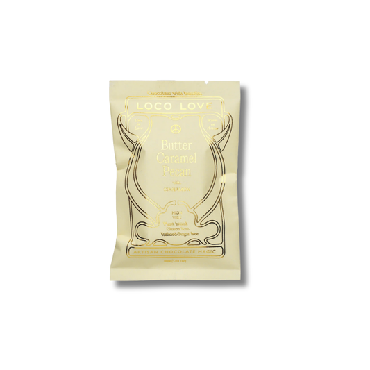 A single stand-up pouch of Loco Love Butter Caramel Pecan Flavors, in a pale cream color with gold foil lettering and decorative line art, set against a plain white background.