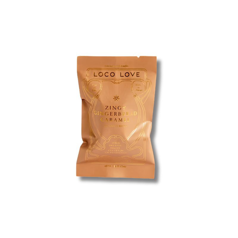A stand-up pouch of Loco Love Gingerbread Caramel in the Zingy variant, featuring a metallic copper-orange background with gold foil text and decorative line art, set against a plain white background.