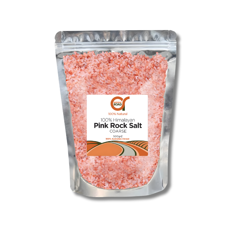 Pink rock salt packaging with a visible brand label on a white background