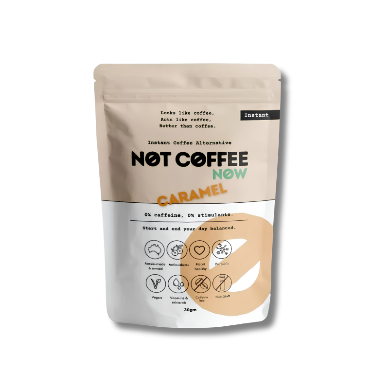 A stand-up pouch of Not Coffee Now Caramel instant coffee alternative, featuring a beige and white design with a large caramel-colored swirl graphic on the front.