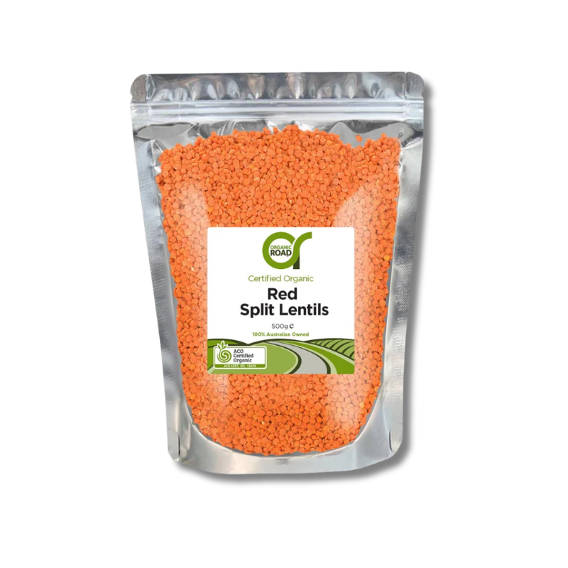 Packaged red split lentils with a visible brand label on a white background