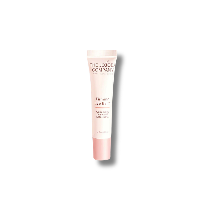 A light pink squeeze tube of The Jojoba Company Firming Eye Balm with a matching pink cap, centered on a white background with a soft drop shadow.